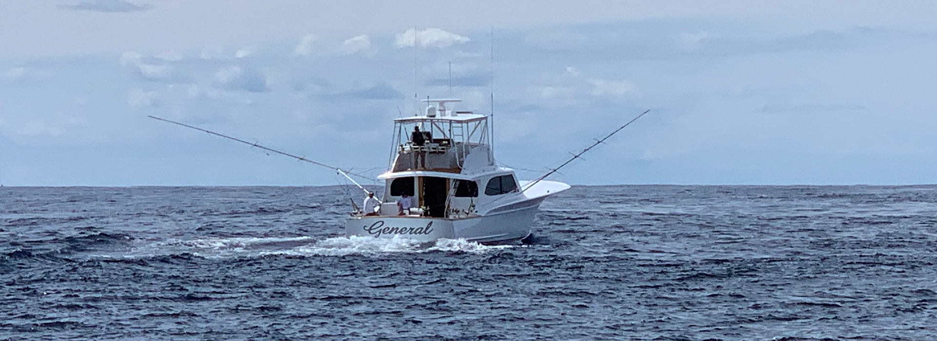 The General sport fishing boat heading offshore at sunrise